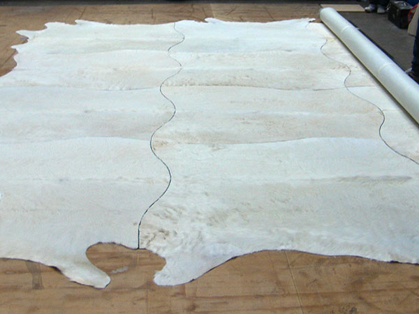 Création d'un tapis en cuir de vachette